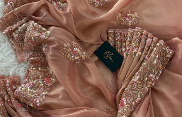 Tk2500 Off on Tissue Silk Saree Dual Tone of Peach and Golden Hues